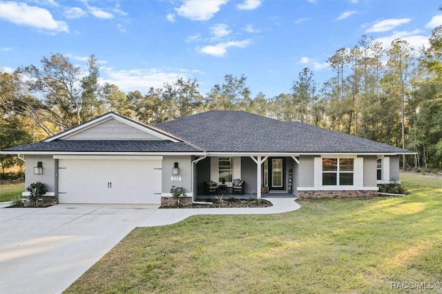 ranch-style house with a garage, driveway, a front yard, covered porch, and stucco siding