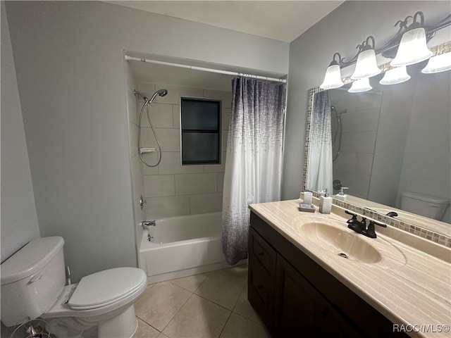 full bathroom featuring tile patterned floors, vanity, shower / tub combo, and toilet