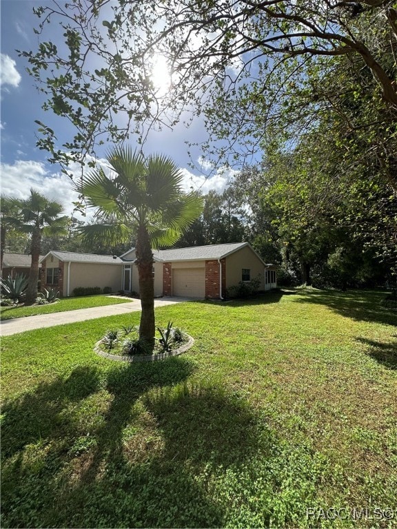 view of yard with a garage