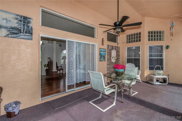 view of patio featuring ceiling fan