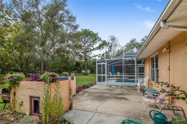 view of patio / terrace with glass enclosure