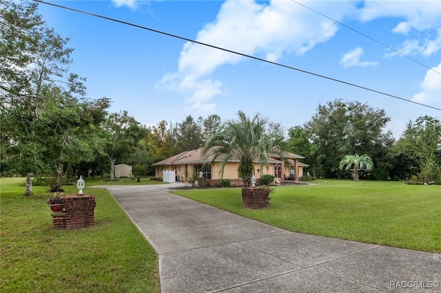 view of front facade with a front lawn