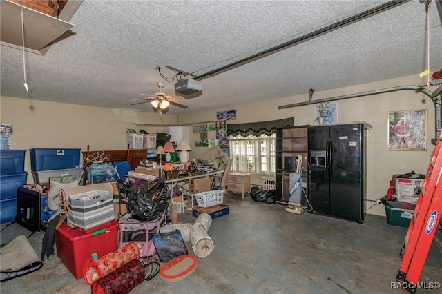 garage featuring ceiling fan, black fridge with ice dispenser, and a garage door opener