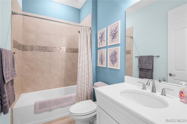 full bathroom with shower / bath combo with shower curtain, vanity, ornamental molding, and toilet