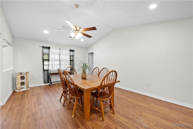 3085 Greynolds Ave, Spring Hill, FL 34608 - dining room featuring ceiling fan, lofted ceiling, light wood finished floors, and recessed lighting