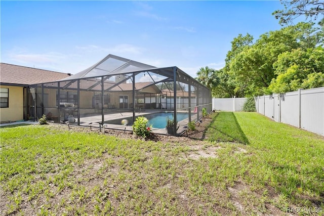 3085 Greynolds Ave, Spring Hill, FL 34608 - fenced backyard featuring glass enclosure