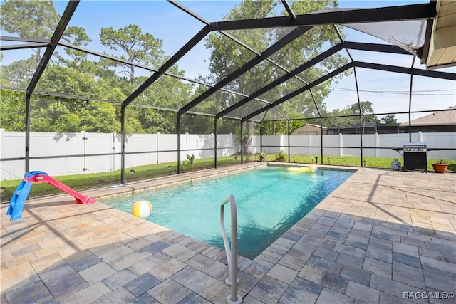 3085 Greynolds Ave, Spring Hill, FL 34608 - view of pool featuring a patio, a fenced backyard, and glass enclosure