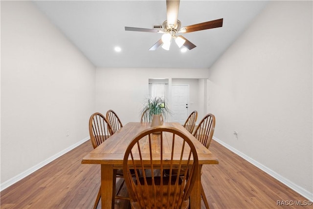 3085 Greynolds Ave, Spring Hill, FL 34608 - dining room with wood finished floors, ceiling fan, and recessed lighting