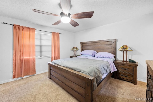 3085 Greynolds Ave, Spring Hill, FL 34608 - bedroom with light carpet, a textured ceiling, and ceiling fan