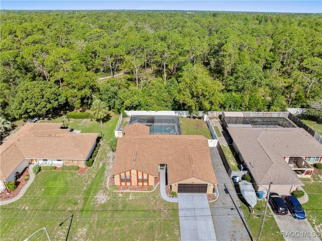 3085 Greynolds Ave, Spring Hill, FL 34608 - aerial view of a heavily wooded area