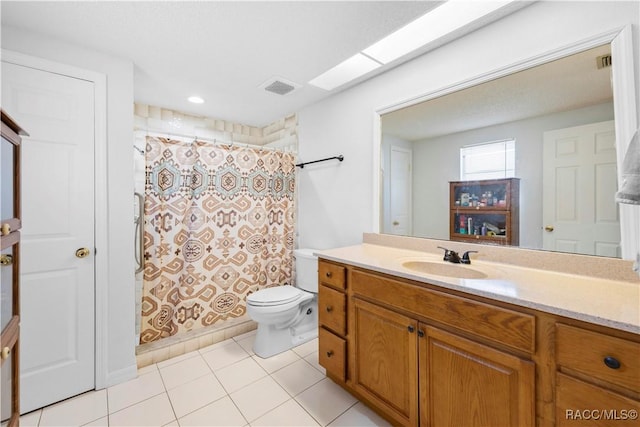 3085 Greynolds Ave, Spring Hill, FL 34608 - bathroom with vanity, tile patterned floors, and a shower with curtain