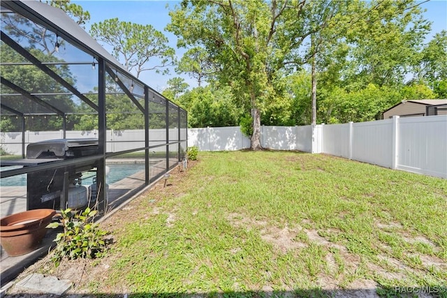 3085 Greynolds Ave, Spring Hill, FL 34608 - fenced backyard with a lanai