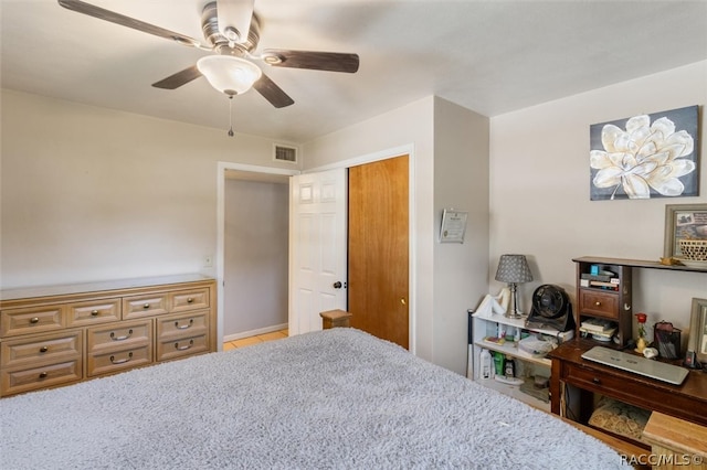 bedroom featuring a closet and ceiling fan