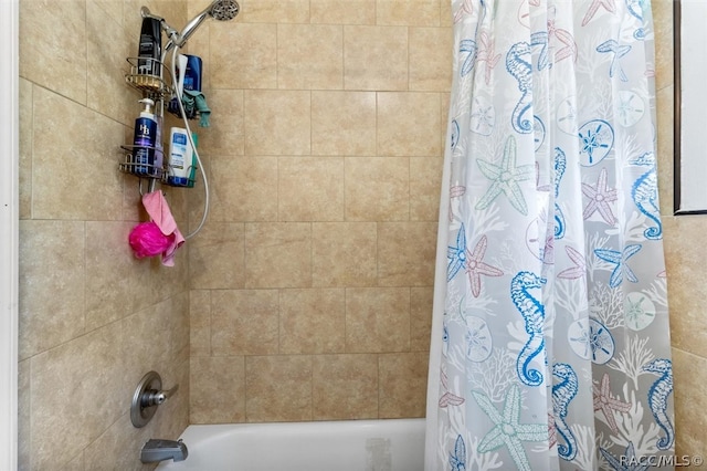 bathroom featuring shower / bath combination with curtain