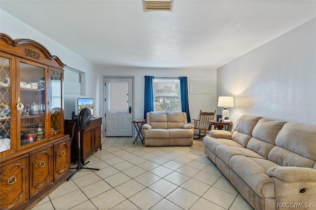 living room featuring light tile patterned floors