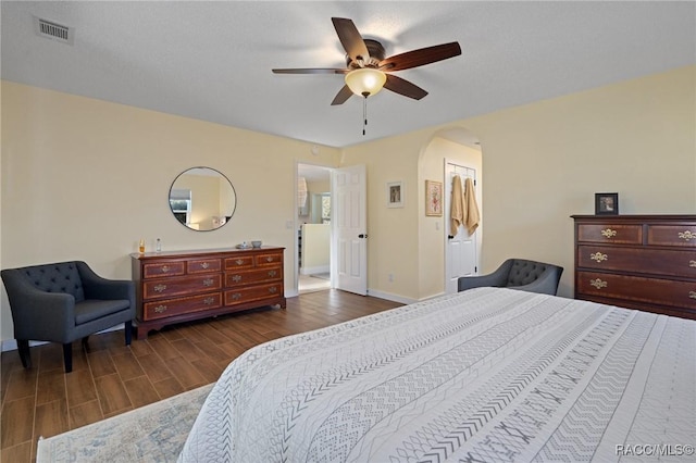 bedroom featuring dark hardwood / wood-style flooring and ceiling fan