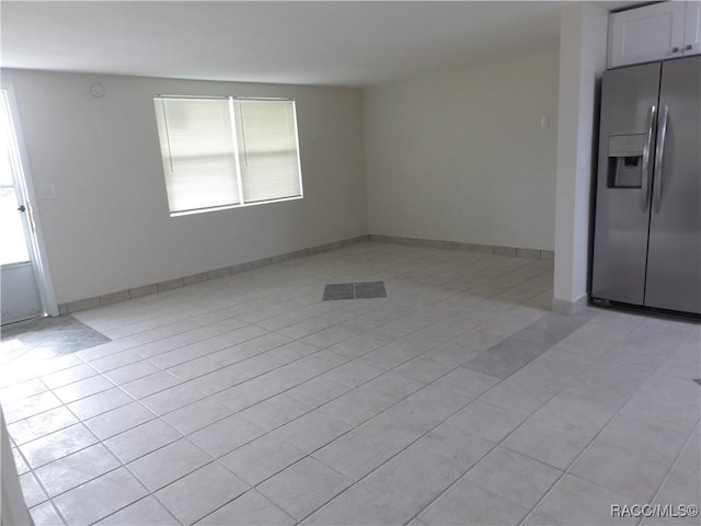 interior space featuring light tile patterned flooring