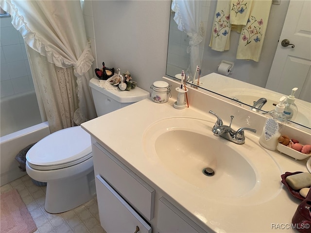 full bathroom with shower / tub combo, vanity, and toilet