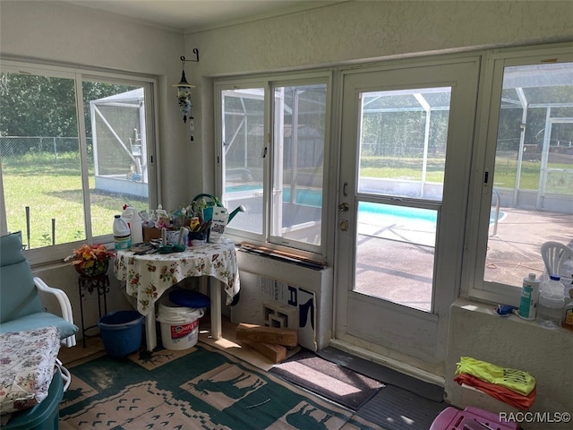 sunroom featuring plenty of natural light