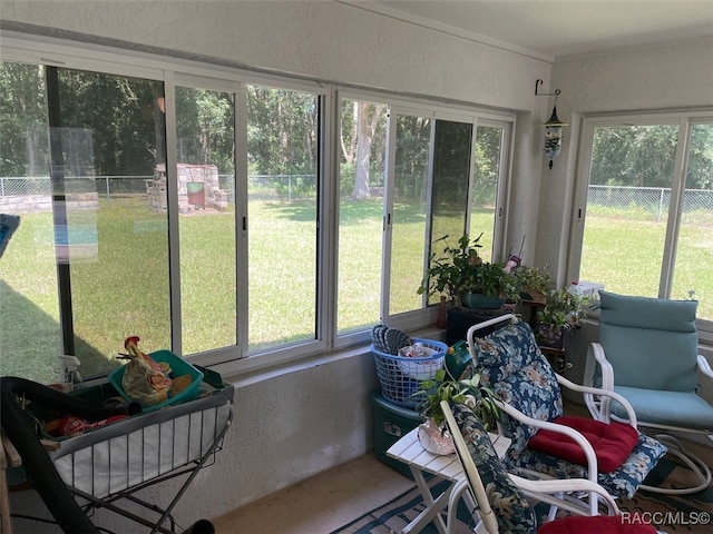 sunroom / solarium featuring a wealth of natural light