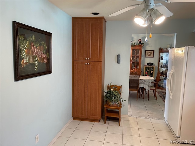 hallway featuring light tile patterned floors