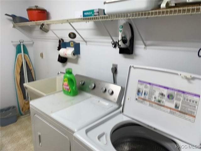 washroom with washer and clothes dryer