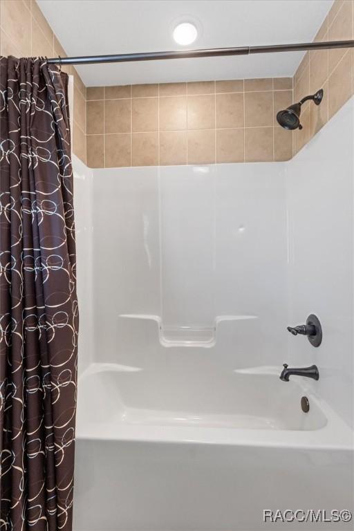 6854 W Sentinel Post Path, Beverly Hills, FL 34465 - bathroom featuring shower / bath combo
