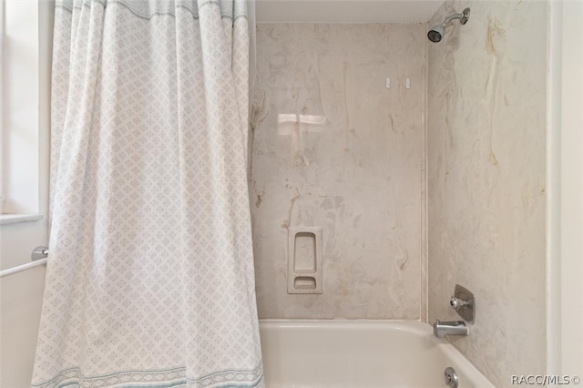 bathroom featuring shower / tub combo