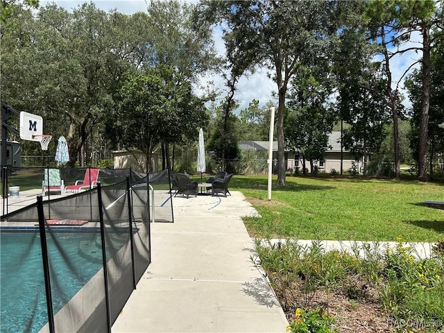 5774 N Lamp Post Dr, Beverly Hills, FL 34465 - view of property's community with a pool and a patio