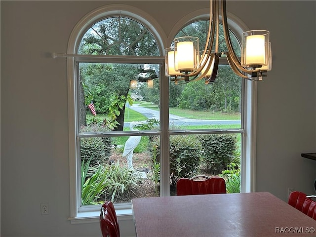 5774 N Lamp Post Dr, Beverly Hills, FL 34465 - dining space featuring a chandelier