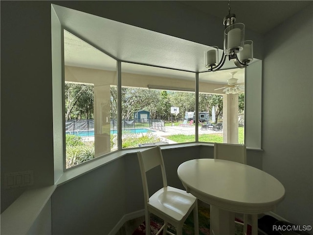 5774 N Lamp Post Dr, Beverly Hills, FL 34465 - dining room featuring ceiling fan and a chandelier