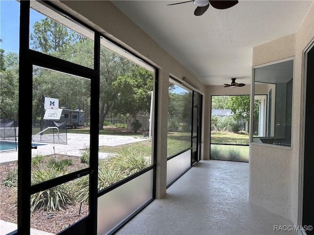 5774 N Lamp Post Dr, Beverly Hills, FL 34465 - unfurnished sunroom with a ceiling fan