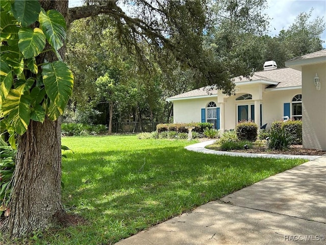 5774 N Lamp Post Dr, Beverly Hills, FL 34465 - view of green lawn