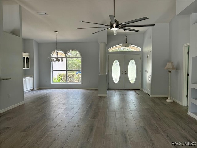 5774 N Lamp Post Dr, Beverly Hills, FL 34465 - entrance foyer with ceiling fan, a chandelier, and wood finished floors