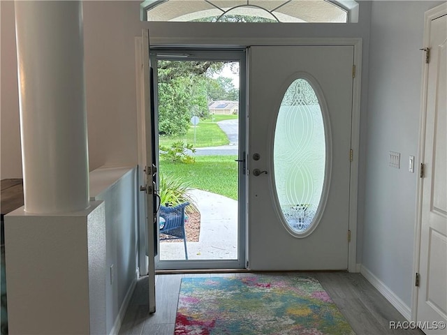 5774 N Lamp Post Dr, Beverly Hills, FL 34465 - entrance foyer featuring wood finished floors and baseboards