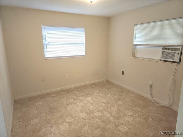 1408/1410 NE 15th Pl, Ocala, FL 34470 - unfurnished room with baseboards and tile patterned floors