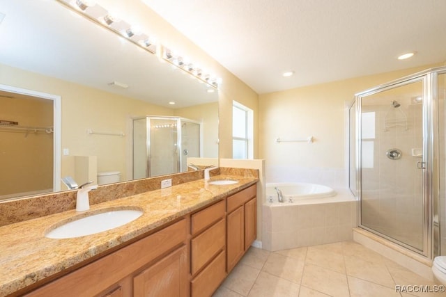 full bathroom with a shower stall, a sink, and toilet