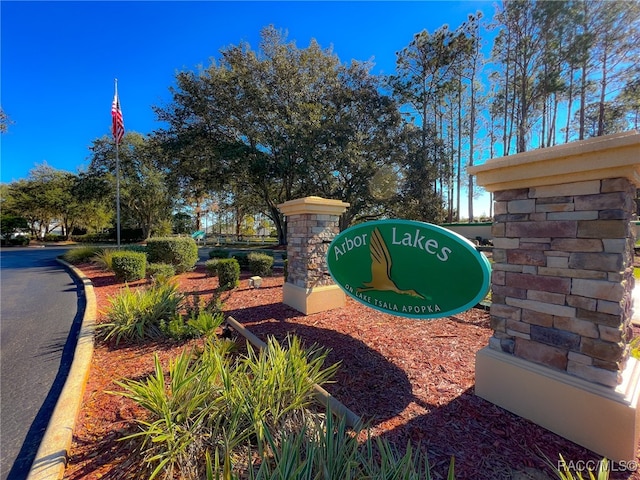 view of community sign