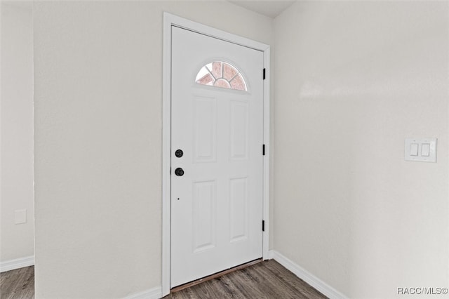 entrance foyer featuring dark hardwood / wood-style flooring