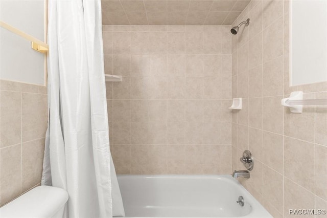 732 Wharton Ter, Inverness, FL 34450 - bathroom with shower / bathtub combination with curtain and tile walls