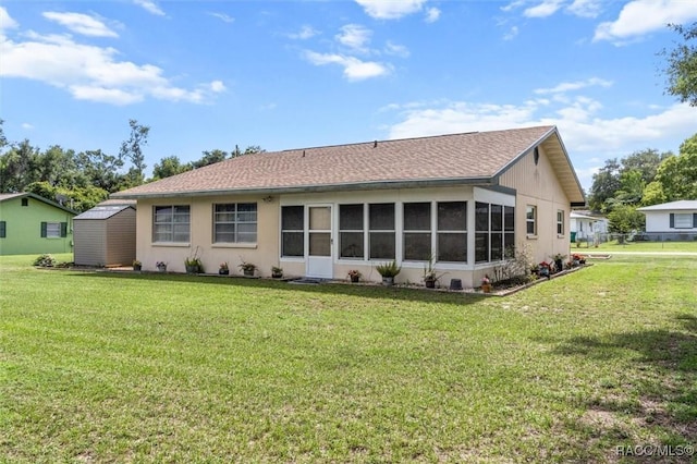 732 Wharton Ter, Inverness, FL 34450 - back of property with a yard, a shingled roof, and stucco siding