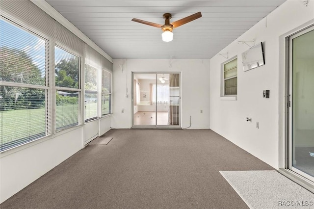 732 Wharton Ter, Inverness, FL 34450 - unfurnished sunroom featuring carpet floors