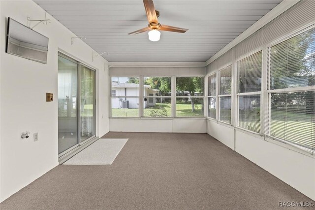 732 Wharton Ter, Inverness, FL 34450 - unfurnished sunroom featuring a ceiling fan