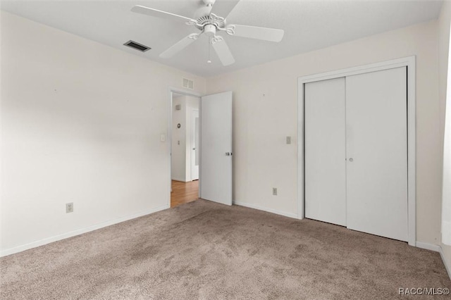 732 Wharton Ter, Inverness, FL 34450 - unfurnished bedroom with carpet floors, a closet, and ceiling fan