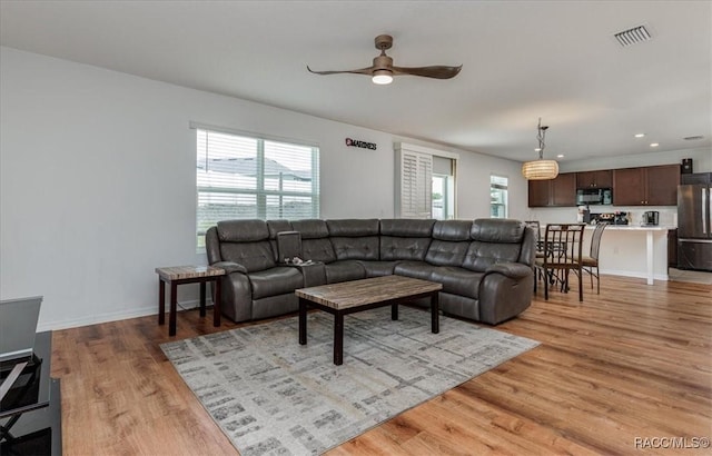 483 W Runyon Loop, Beverly Hills, FL 34465 - living area with light wood finished floors, ceiling fan, and recessed lighting