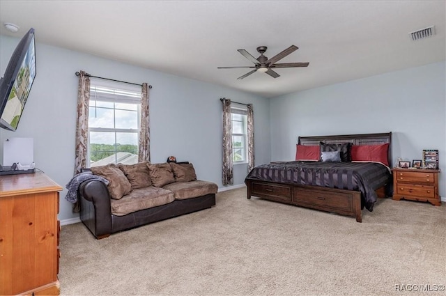 483 W Runyon Loop, Beverly Hills, FL 34465 - bedroom featuring multiple windows, carpet floors, and a ceiling fan