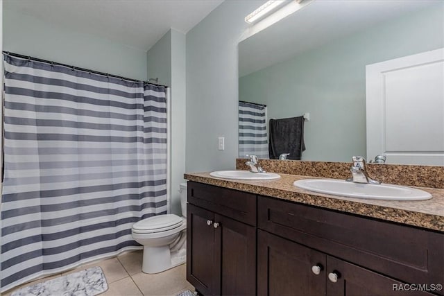 483 W Runyon Loop, Beverly Hills, FL 34465 - full bath with double vanity, tile patterned floors, and toilet