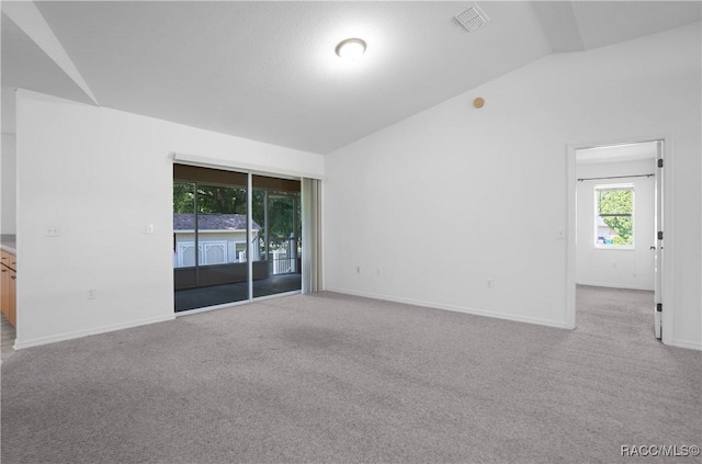 604 Morse St, Inverness, FL 34452 - carpeted spare room with lofted ceiling and baseboards