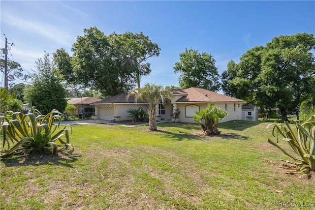 604 Morse St, Inverness, FL 34452 - view of green lawn with an attached garage and driveway