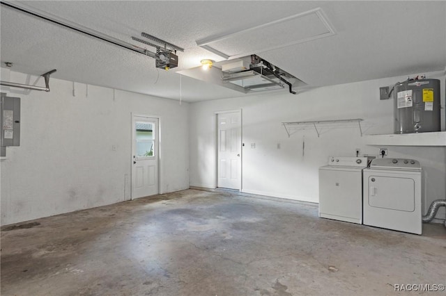 garage featuring electric panel, washer and clothes dryer, a garage door opener, and electric water heater